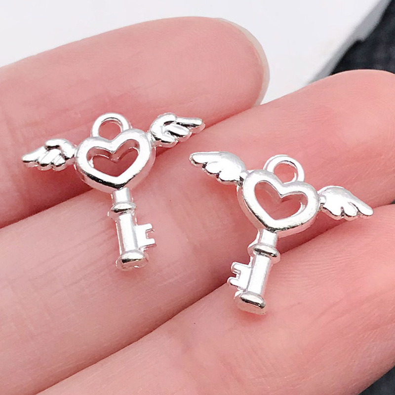 100個のレトロな5色の愛の鍵を混ぜた四つ葉のクローバーの鍵合金ペンダント手作りdiyアクセサリーの部品卸売り|undefined