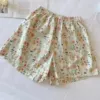 Apricot trousers, shorts, flowered