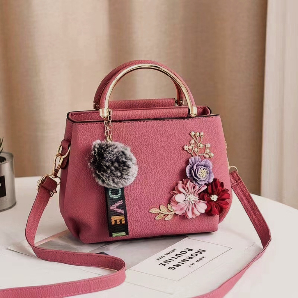 Bolso de mano para mujer con diseño floral, bolso de moda con colgante de bola de pelo, bolso de hombro y bandolera.