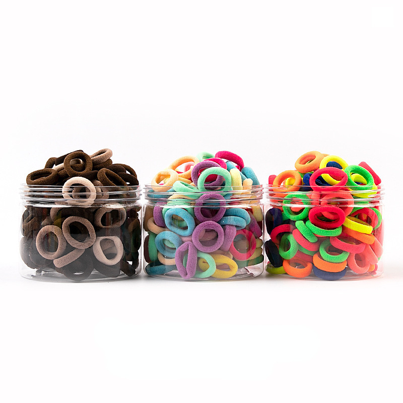 100 unids/puede nuevo estilo coreano accesorios para el cabello de los niños de alta elástico toalla anillo sin costuras pequeño tamaño caramelo color pelo anillo al por mayor