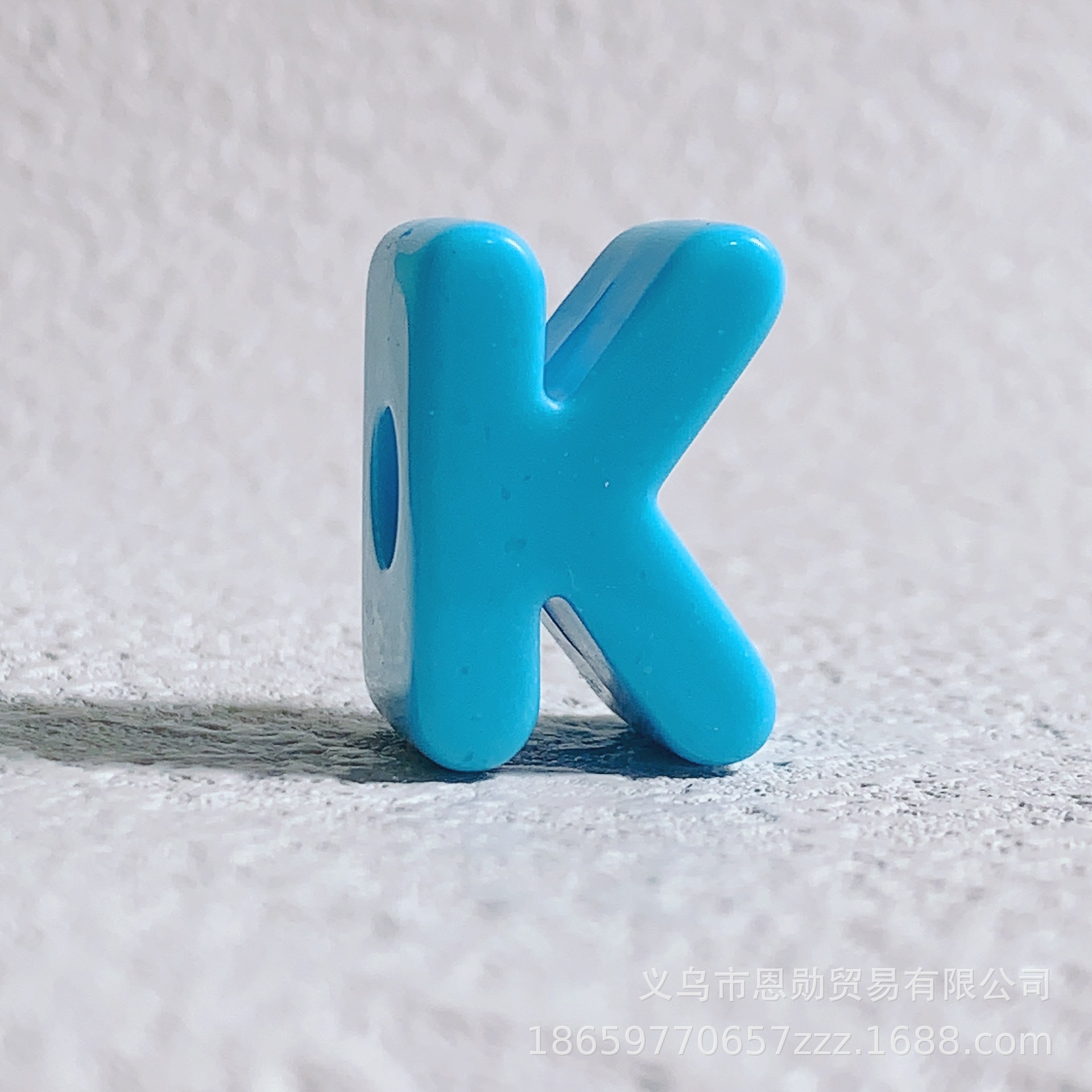 K (Blue)