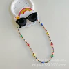 Colorful sugar beans + black glasses