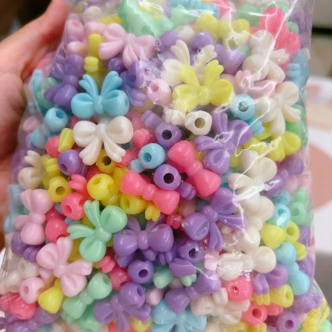 2025 Nuevas cuentas de cabello baratas en bolsa nuevas cuentas de plástico de color primavera diy gran agujero image 11