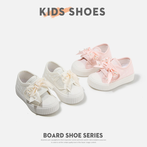 Spring and autumn children's canvas shoes with soft soles and soft surfaces, girls 'skate shoes, bow, pearl velcro, baby fashion