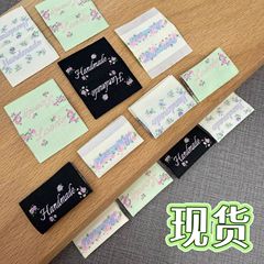 スポット韓国製ラベル襟ラベル手作り手作り布ステッカー小花ヘアアクセサリーかわいくて絶妙な折りたたみラベル布ラベル卸売