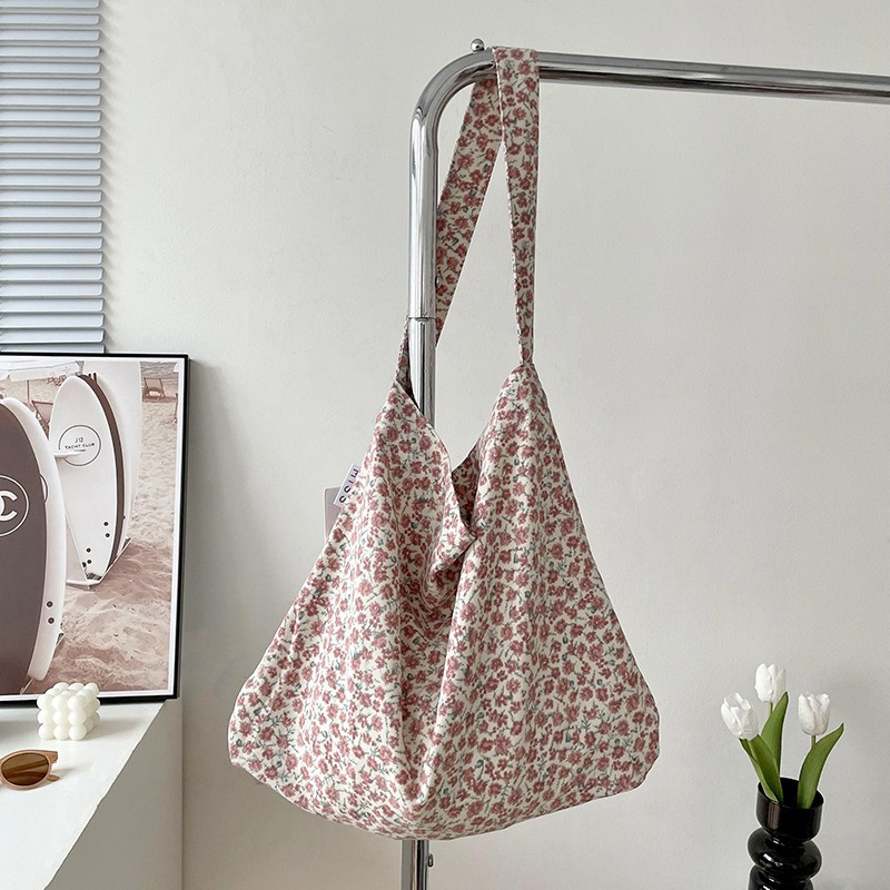 Diseño nicho bolsas de lona para mujeres 2025 nueva gran capacidad coreana estampado de leopardo flor de hombro impresa bolsas de mujer