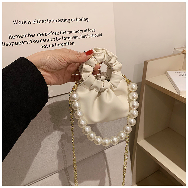 255g Weight Beading, Pearls Fashion Element Clasp Frame Closure Type Top Handle, Chain Strap Type Crossbody Bag Bags Type Casual, Daily, Shopping Occasion Pu Leather Material Solid Color Pattern All Seasons Season Kid'S Gender Cute Style Bucket Shape Kid'S Pu Leather Solid Color Cute Beading Pearls Bucket Clasp Frame Crossbody Bag 14