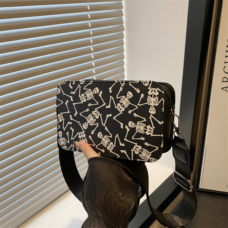 Bolso de mujer transfronterizo 2025 nuevo bolso de mujer impresión calavera cámara bolso pequeño bolso de hombro de aire extranjero bolso de mochila de teléfono móvil