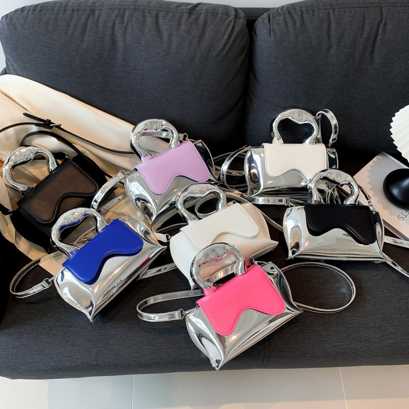 Bolso de diseño de nicho para mujeres 2025, nuevo bolso dulce, personalidad dulce, bolso de mano de moda, comercio exterior