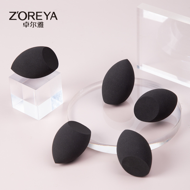 Zhuolya nuevo maquillaje huevo esponja puff belleza herramienta bolsa color sólido maquillaje huevo venta al por mayor traje de huevo de belleza