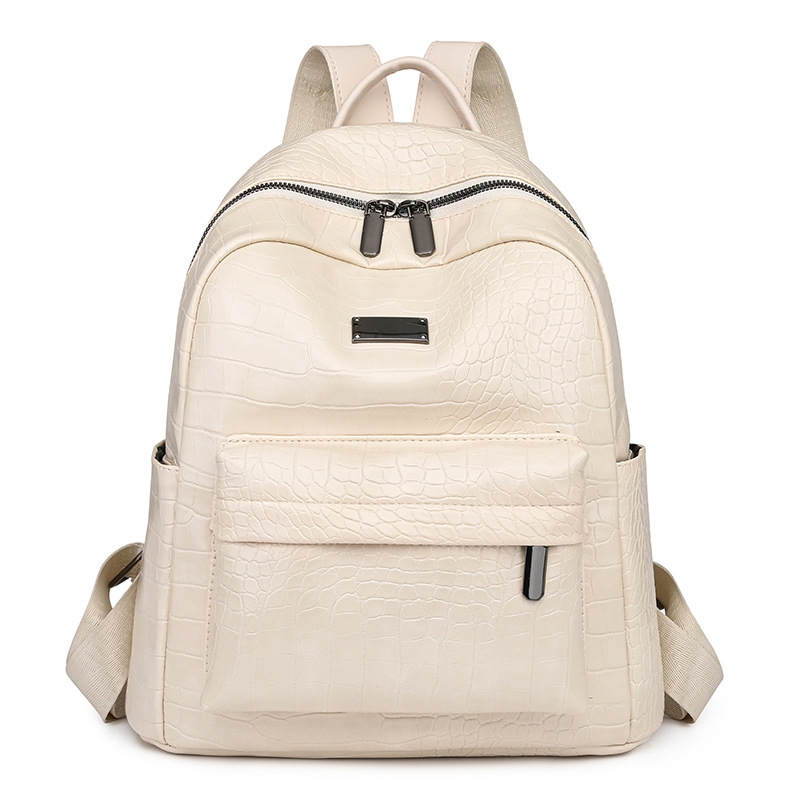 2025 primavera nueva mochila de cuero suave para mujer, mochila de viaje urbano de todo fósforo de moda, mochila escolar para estudiantes universitarios al por mayor