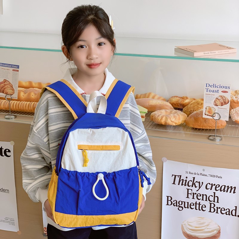 Mochila de estudiantes de escuela primaria de gran capacidad, moda coreana, mochila para niños y niñas, nueva mochila para niños de comercio exterior transfronterizo.