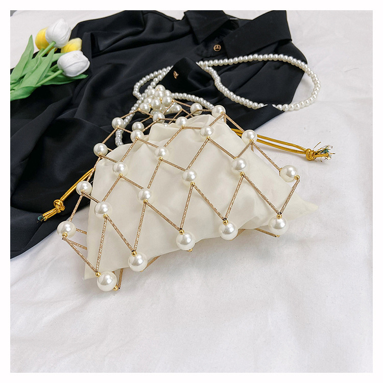 Women's Small Plastic Solid Color Vacation Beach Pearls Hollow String Beach Bag display picture 7