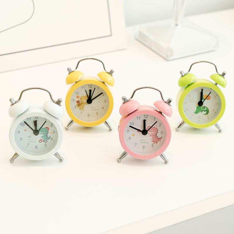 Directo de fábrica estilo Coreano de metal simple mini reloj despertador estudiante color caramelo pequeño dinosaurio lindo Reloj portátil