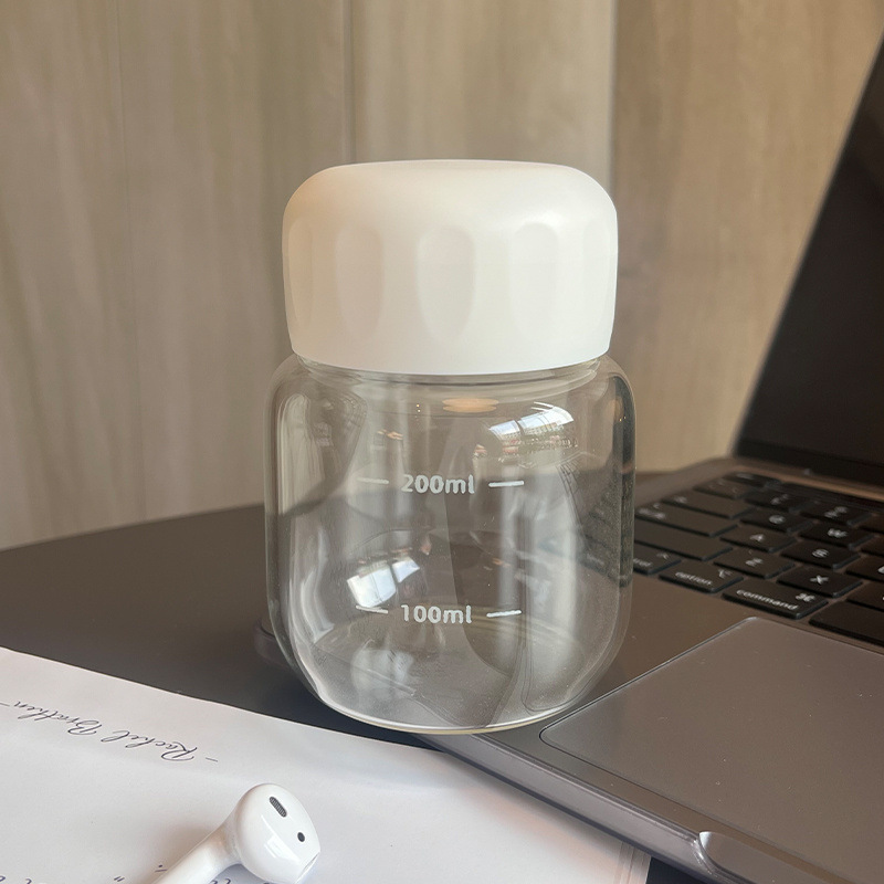 耐高温牛乳カップ蓋付き子供目盛カップ朝食に哺乳瓶を飲みます。|undefined