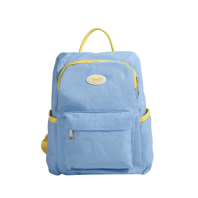 Mochila casual y sencilla para niños y niñas, estilo occidental, lindo color caramelo, mochila escolar para estudiantes de escuela primaria, nueva mochila para niños transfronteriza