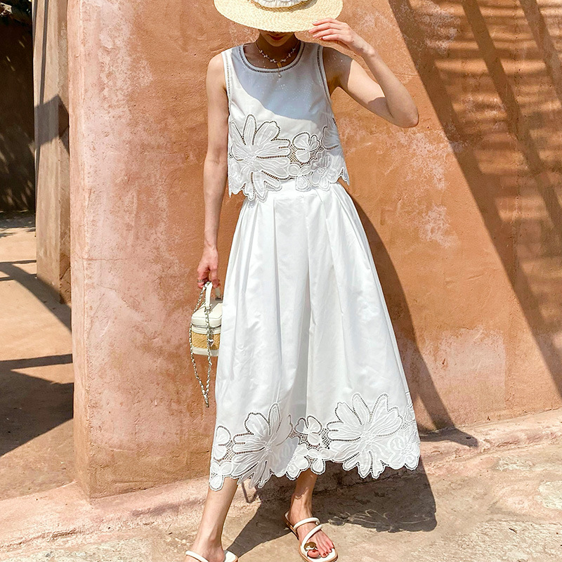 K White Ladies' Cut-Out Top With Embroidered Midi Skirt Set. No Necklaces Or Other Accessories_ecoleips.com