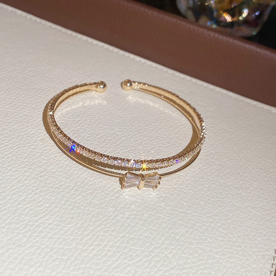 Doble arco de zircon brazalete abierto de moda diaria pulsera versátil ligera de lujo nicho alta sensación de joyas al por mayor