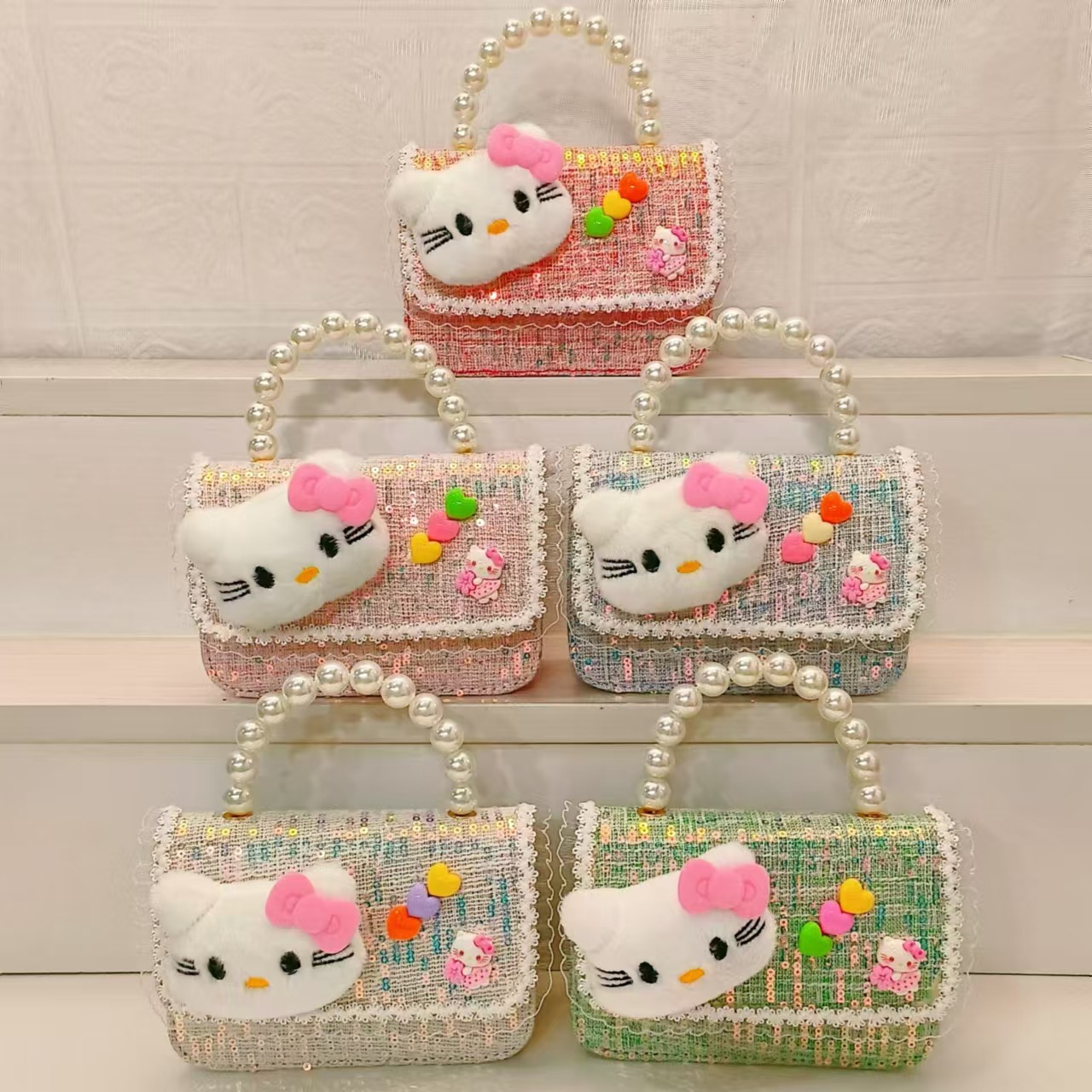 Bolsa de perla de dibujos animados de un hombro con una pequeña bolsa de cambio de viento bolsa de accesorios de niños bolsos cuadrados cadenas mochila de chicas