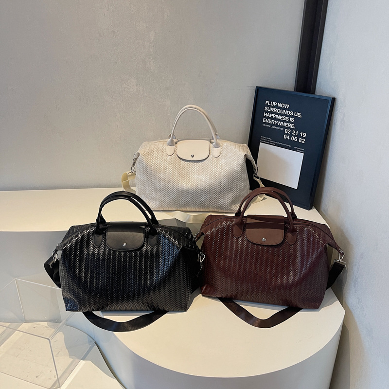 Bolsa de viaje de gran capacidad retro herringbone transfronteriza, bolsa de ejercicios deportivos al aire libre para mujeres, bolsa de hombro de un solo hombro.