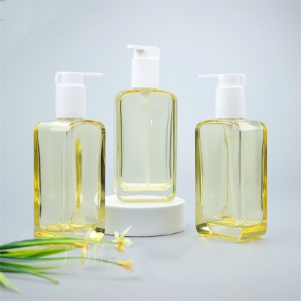 AM Fuyu Manpu mismo estilo 150g botella de limpiador facial presionando esencia loción botella de vidrio cosméticos sub-embotellado en stock