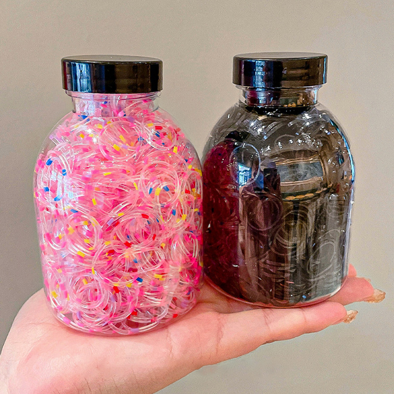 Las bandas de goma desechables de color para niños no dañan el cabello