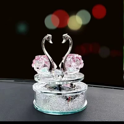 Car ornaments: Style for Women - solar-rotating-pink-swan