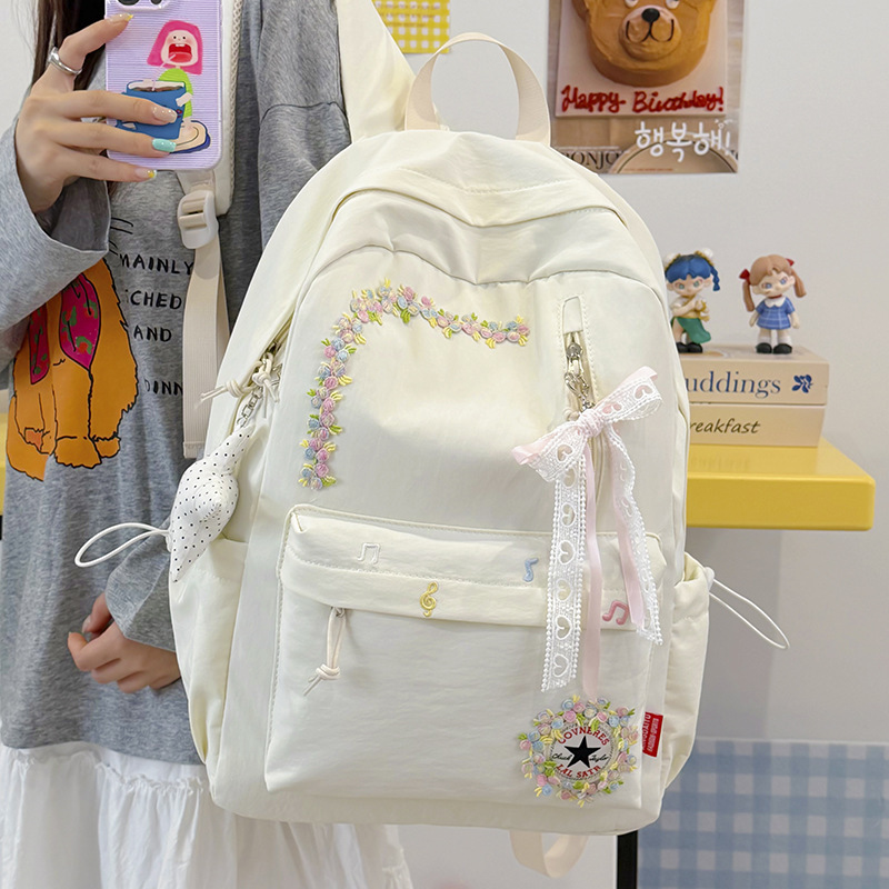 New cross-border casual trendy backpack with floral design, high aesthetic appeal, lightweight school bag, large capacity, popular campus backpack New cross-border casual trendy backpack with floral design, high aesthetic appeal, lightweight school bag, large capacity, popular campus backpack