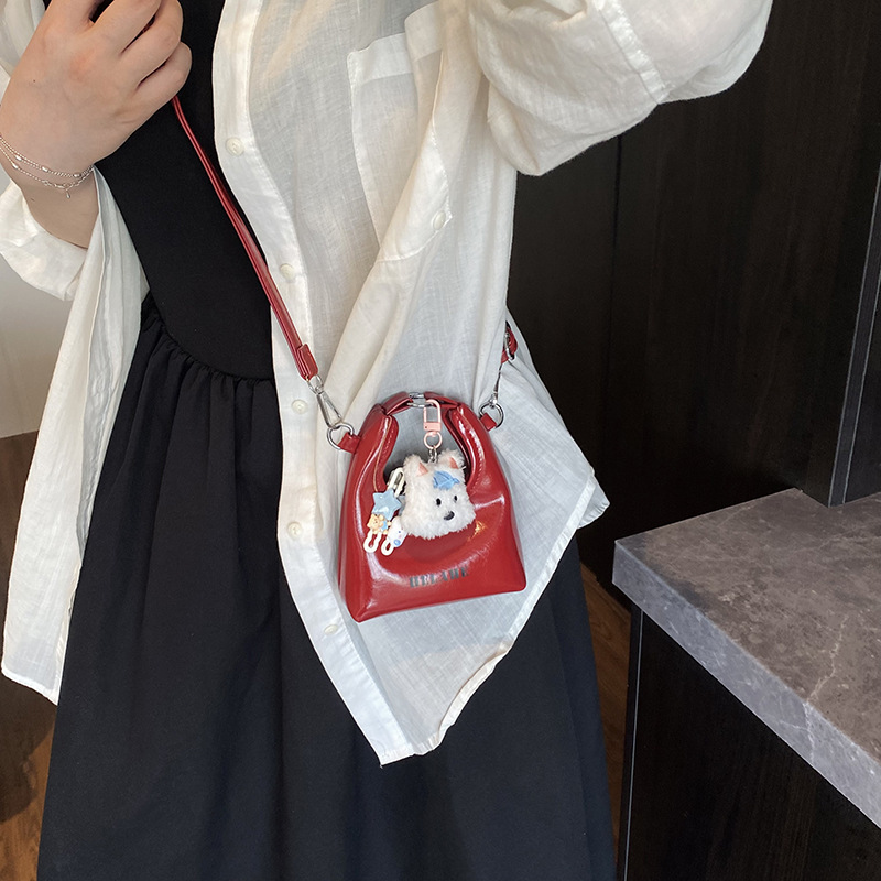 Bagos para niños otoño y invierno nuevo retro mini bolso de mano de piel de aceite lindo perro bolso de media luna auriculares lápiz labial bolso de mochila