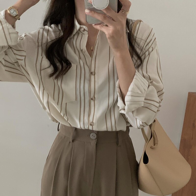 Korean-style striped long-sleeve shirt, niche design, spring and autumn 2026 new model, loose-fitting, elegant shirt top Korean-style striped long-sleeve shirt, niche design, spring and autumn 2026 new model, loose-fitting, elegant shirt top