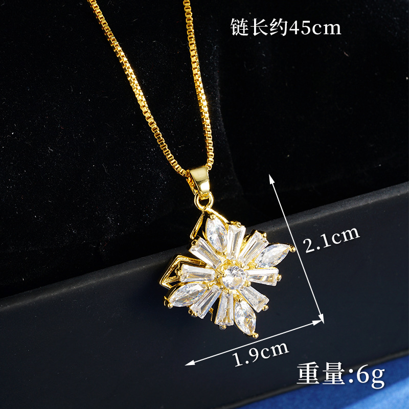 Nuevo oro de arena collar de flores de molino de viento geométrico mujer lujo ligero viento frío nicho joyería anillo fuente al por mayor