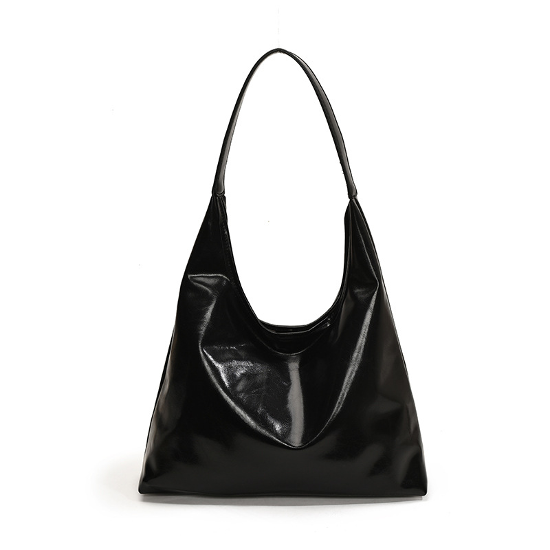 Este año, la moda coreana retro texturas de transporte móvil bolso de hombro para mujeres, 2024 invierno nuevo brazalete