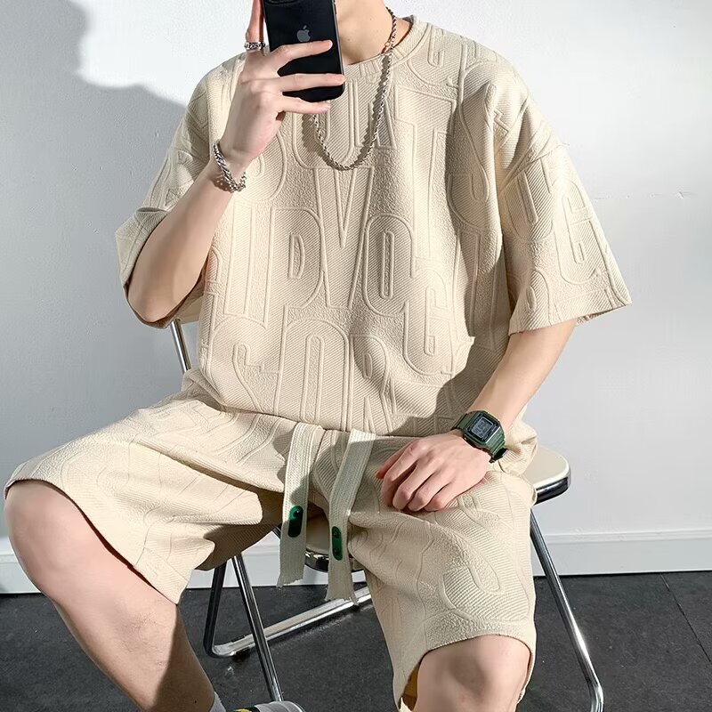 Camisa menos ropa verano nuevo traje de jacquard con letras tridimensionales, pantalones deportivos casuales de sal para niños, traje de dos piezas