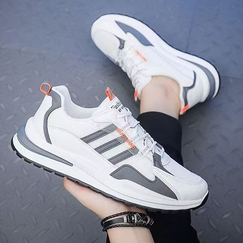 Zapatos deportivos de color rojo de moda de suela gruesa ligera al aire libre zapatos de corrida de malla al por mayor