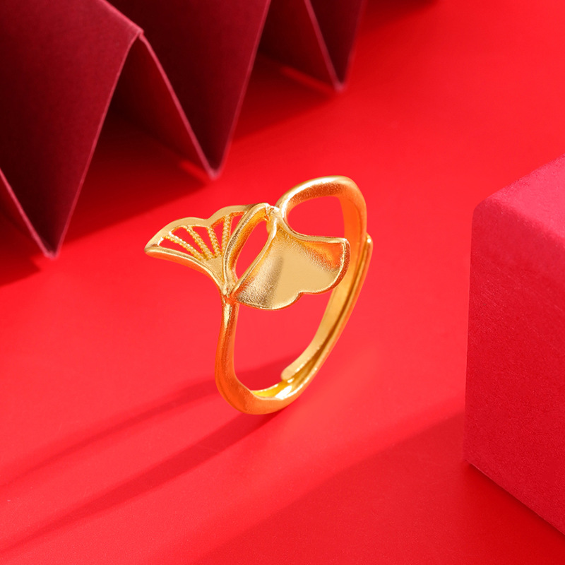 Nuevo anillo de oro de vietnam hoja de ginkgo femenina flor de cuatro hojas hueco ajustable anillo de oro de imitación todo fósforo joyería de estilo nacional
