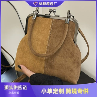 跨境小众设计包包女式2025新款秋冬复古斜挎包拼接手提夹口口金包
