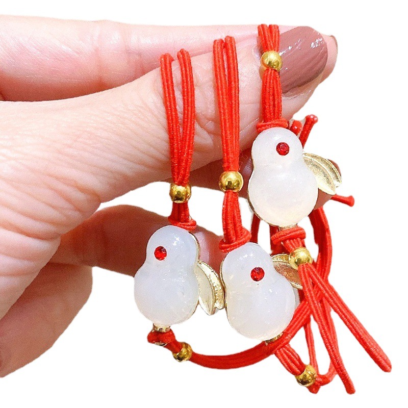 Año nuevo pelo rojo cuerda animal año conejo pelo banda accesorios para el pelo al por mayor pelo pulsera de doble uso pequeña banda de goma