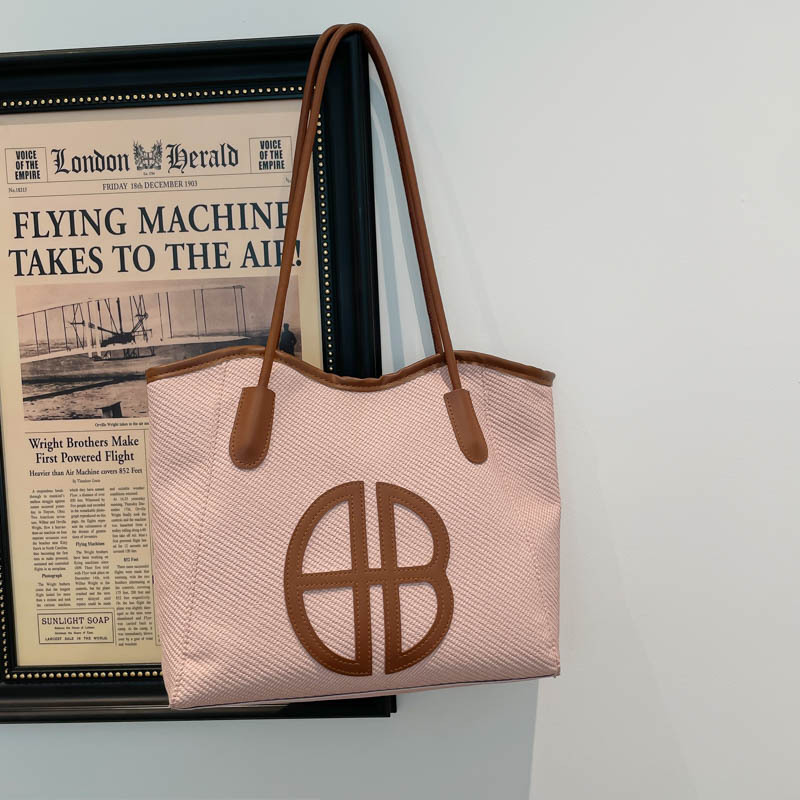 Bolsa de brazo de gran capacidad para viajar 2026 nueva moda bolso de mujer de alto nivel nicho bolso de hombro bolso especial para mujeres