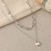 Fashionable retro jewelry, necklace heart-shaped, simple and elegant design, bright catchy style