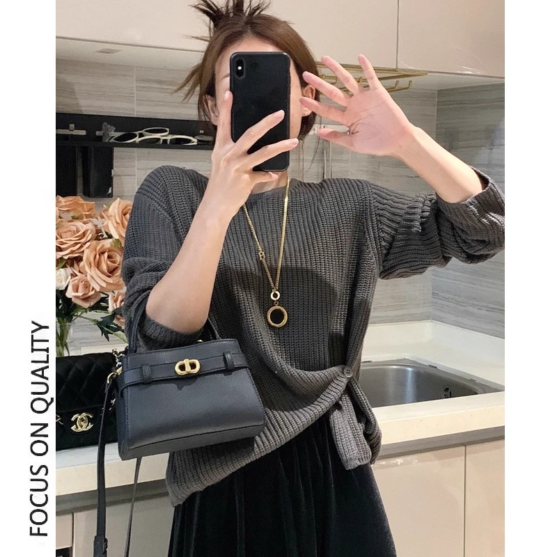 2025秋季新款百搭简约休闲纯色韩系设计感下摆提扣针织衫女毛衣