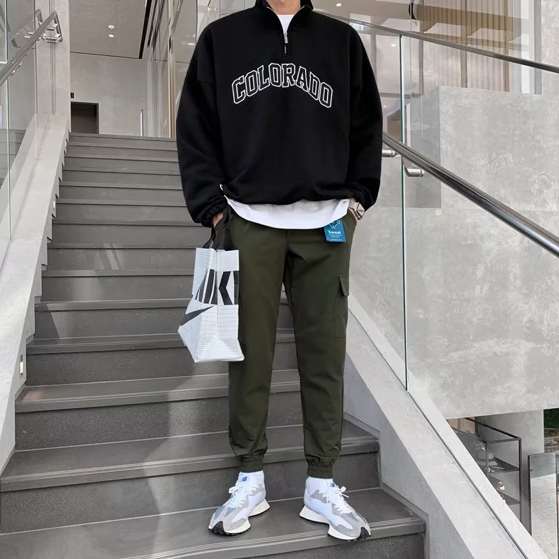 Semi-cremallera chaqueta de estilo de moda masculina estilo de estilo de moda letras impresión chaqueta coreana suelta chaqueta de primavera y otoño de manga larga