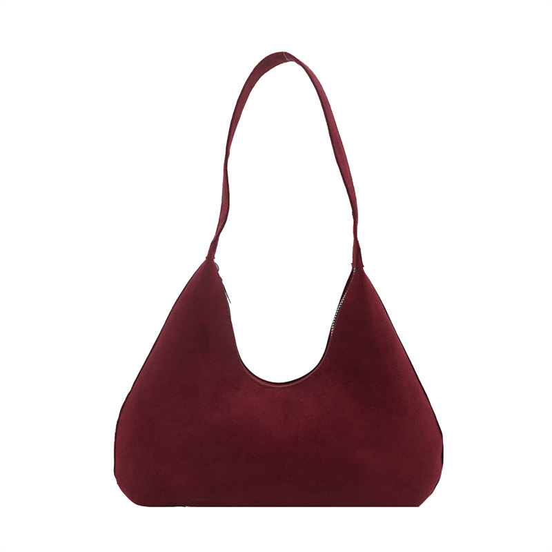 Bolsa de mano de textura retro coreana para mujeres 2025 primavera nuevo estilo de viaje al trabajo molido bolso de hombro axilla