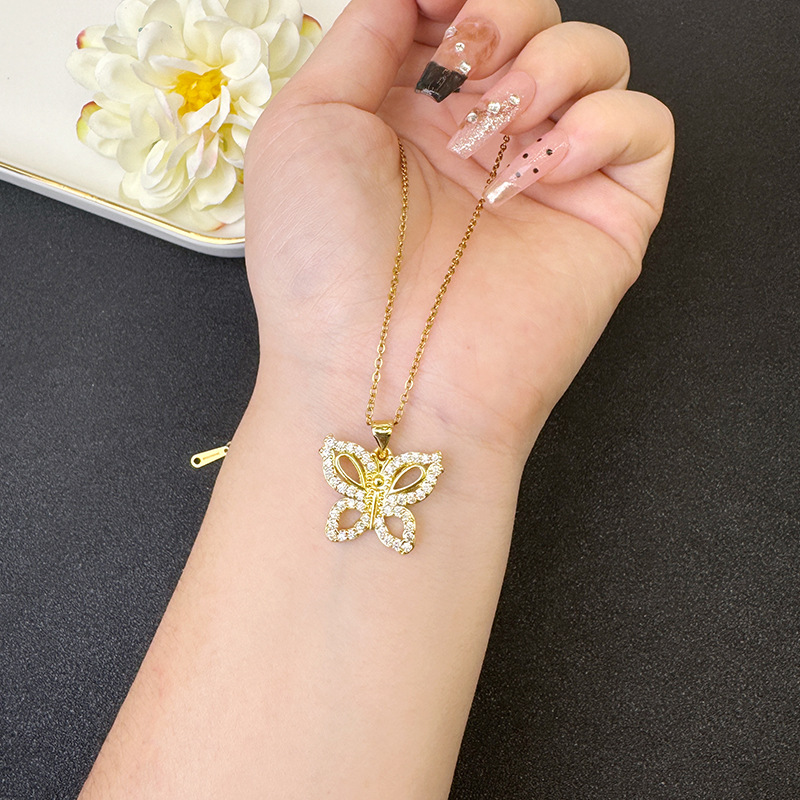 Vietnam Shajin Estilo europeo y americano Estilo explosivo Collar de mariposa Diamante de mujer Destello exquisito Lujo ligero Pendientes de alta gama al por mayor