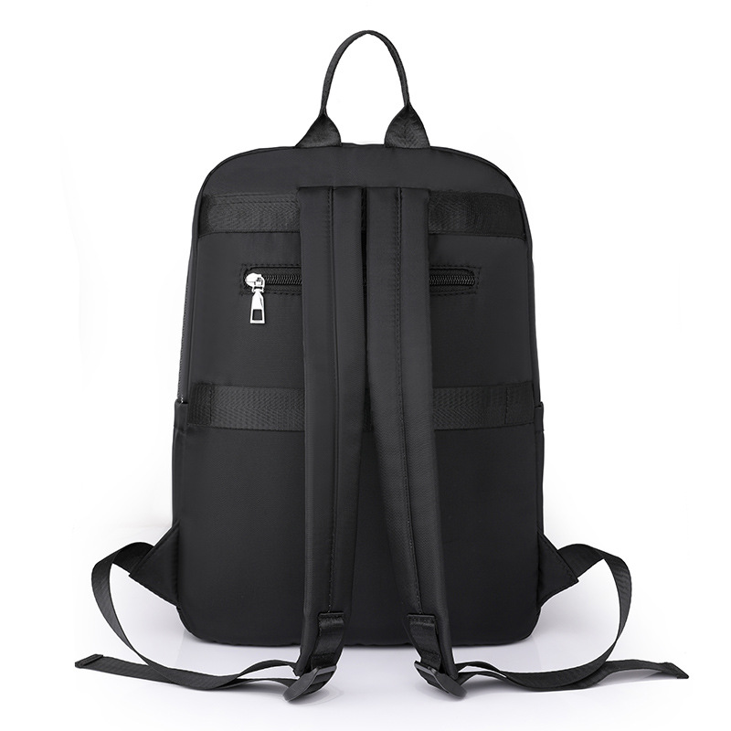 Mochila para computadora de 14 pulgadas de gran capacidad 2024 nueva mochila de viaje ligera de nailon casual mochila escolar simple de color sólido