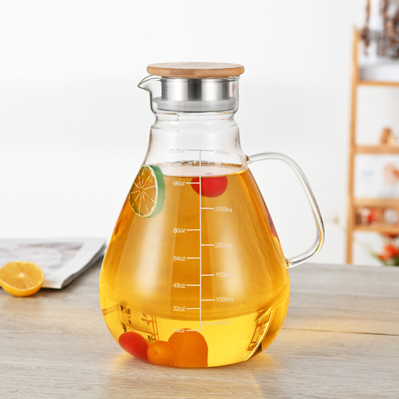 Botella de agua fría de vidrio resistente al calor del fabricante cubierta de acero inoxidable olla de jugo de gran capacidad botella de agua fría de vidrio transparente