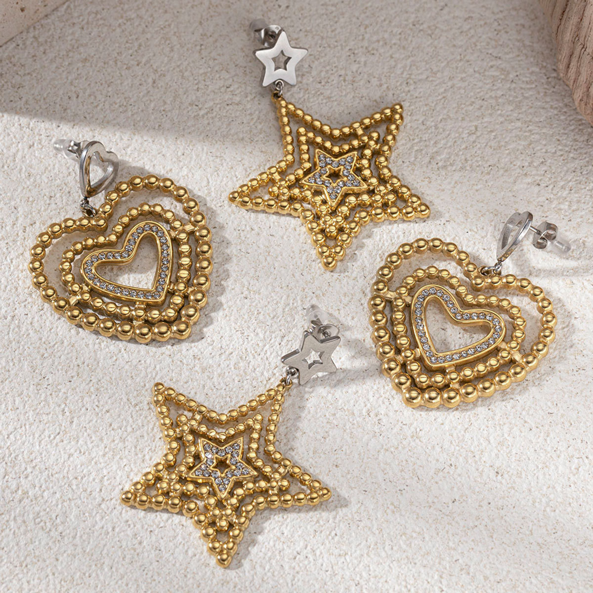 Collar de acero inoxidable de lujo ligero de alto nivel, estrellas de amor, orejetas chapadas en titanio, acero de titanio, mujeres no desvanecen