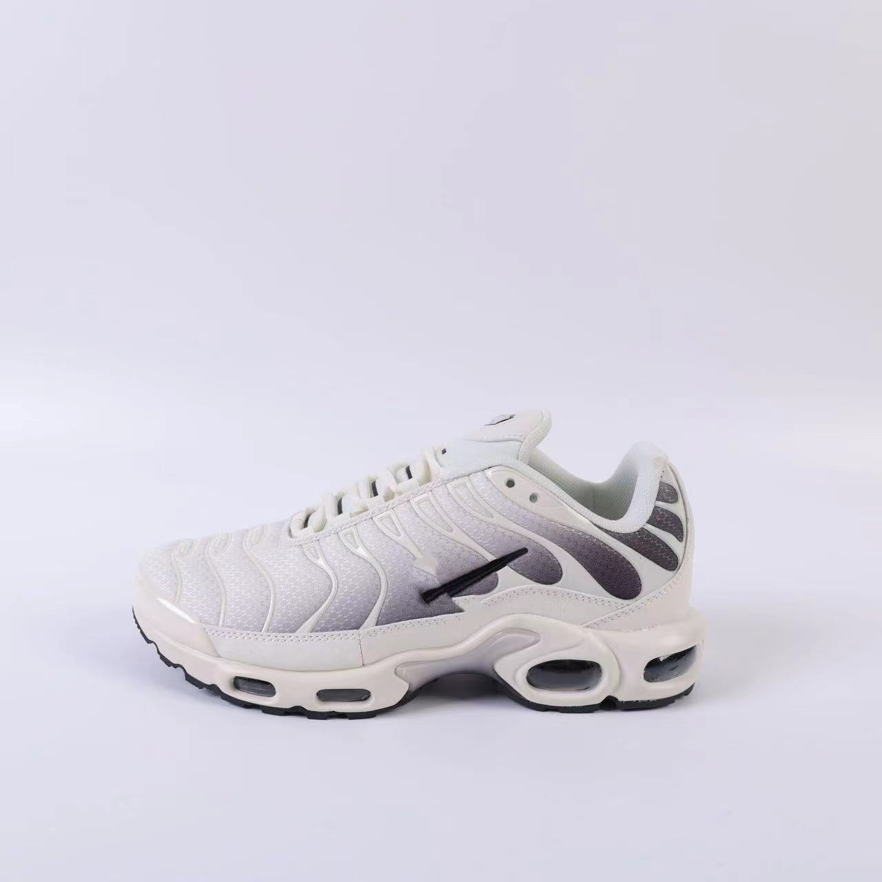 Putian transfronterizo 2025 TN1 generación de cojín de aire, zapatos de corrida casuales, zapatos deportivos de pelota azul, comercio exterior transfronterizo, una generación