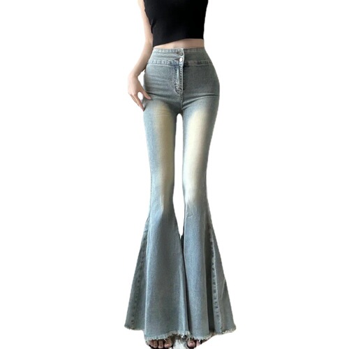 Plus-size flared denim jeans for women, high-waisted, wide-leg design—perfect for an early autumn look that slims and highlights a retro vibe with stretchy, floor-length fabric.