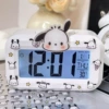 White alarm clock, Pacha dog, battery, stickers