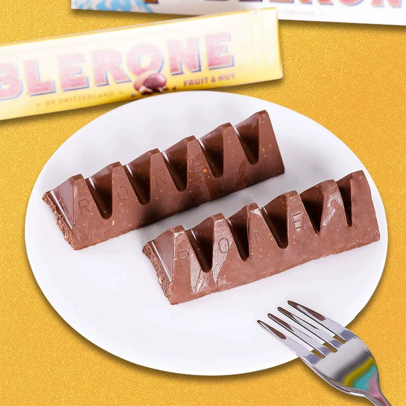 Импортированный треугольный шоколад Toblerone (Toblerone) 100 г — assorted вкусы: молочный, тёмный, белый, солёный